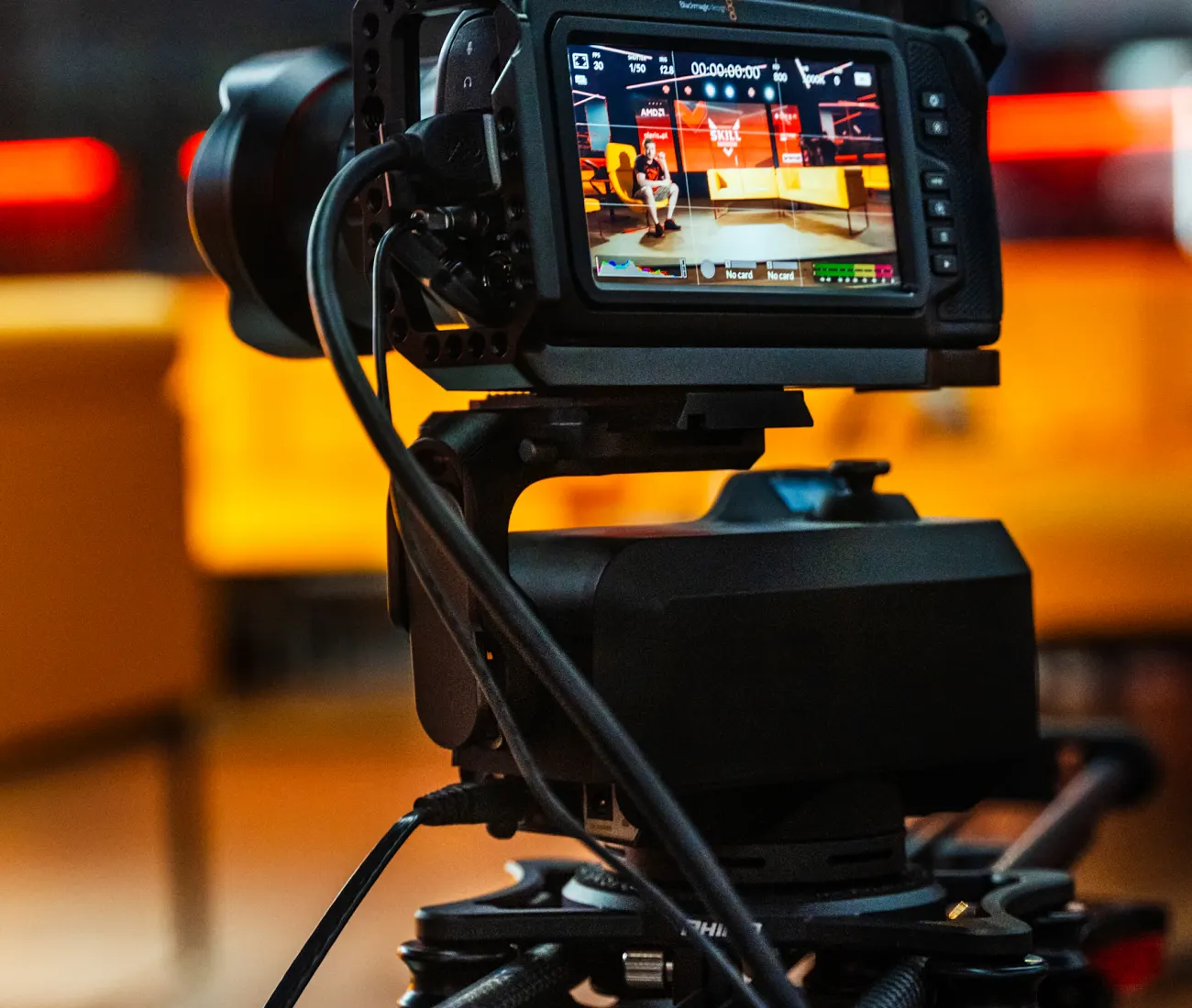 A Blackmagic cinema camera on a slider in a production workspace